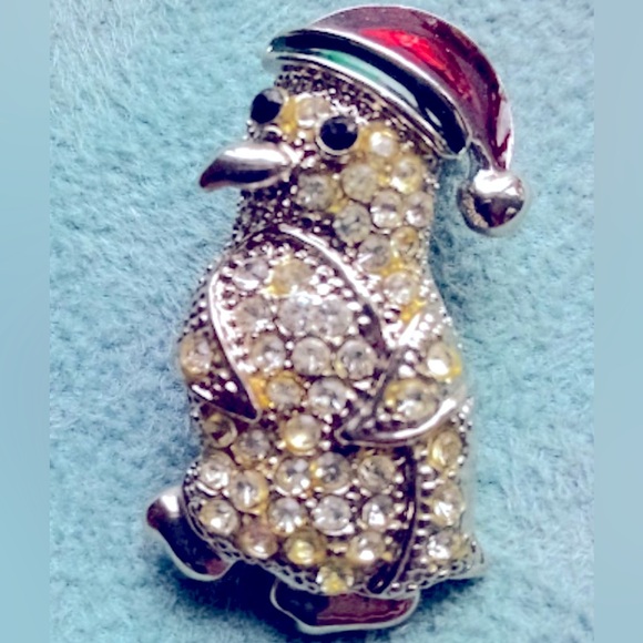 Penguin Pin,  red green holiday stocking cap, a silver rhinestone body 1.75x.75” - Picture 1 of 1